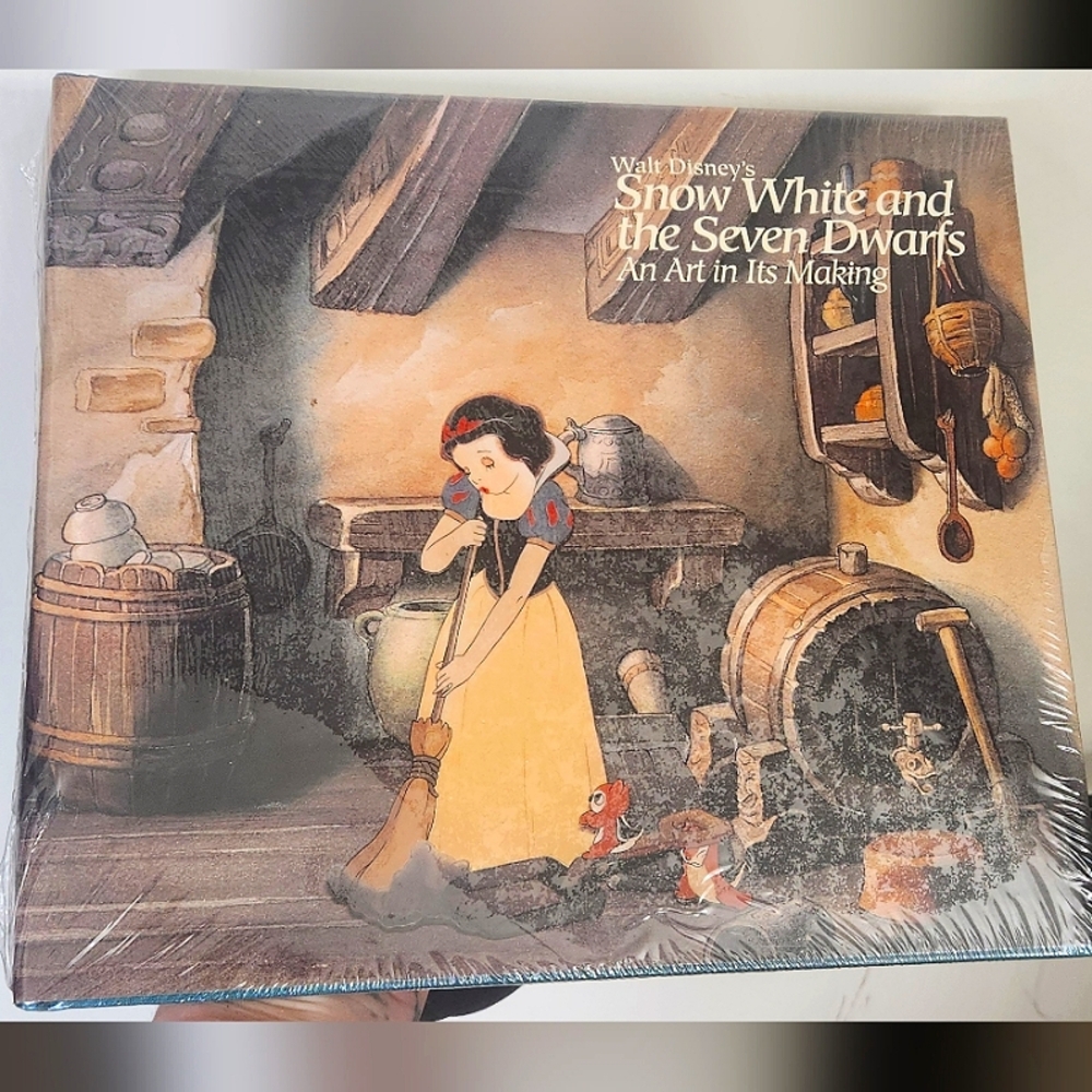 Walt Disney's Snow White and the seven dwarfs in art and it's making hardcover